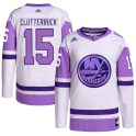 Adidas New York Islanders Men's Cal Clutterbuck Authentic White/Purple Hockey Fights Cancer Primegreen NHL Jersey